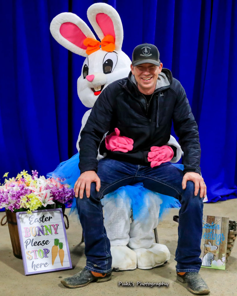 Brad Shirey sits on the Easter Bunny's lap at this Ohio Barrel Race.