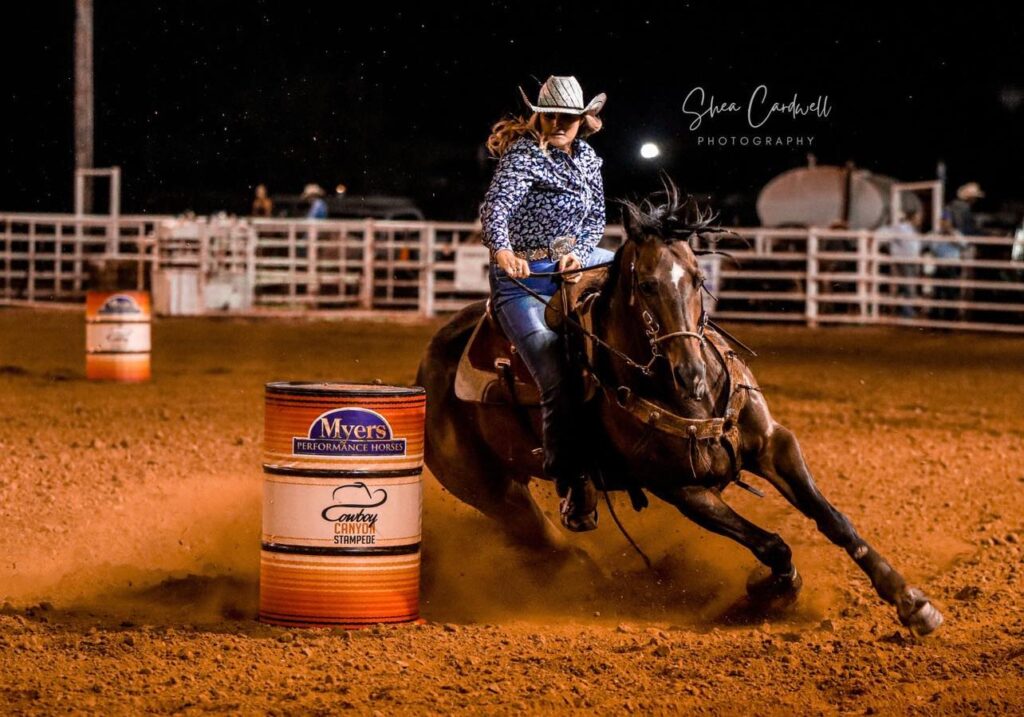 Britteny Hipp rounds the second barrel