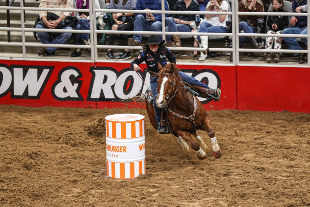 Jordon Briggs turns the first barrel at the San Antonio Stock Show & Rodeo in the barrel racing.