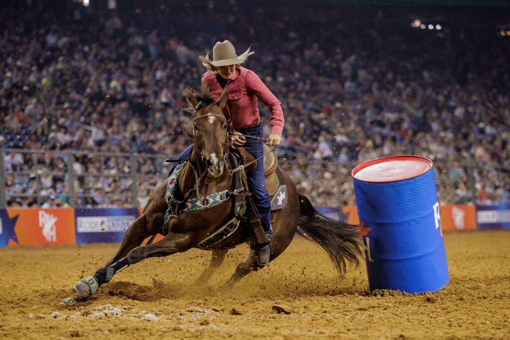 Shannon Griffin turns a barrel in the barrel racing at RodeoHouston.